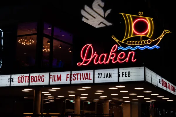 A neon Draken cinema sign with a Viking ship above a marquee for the 46th Göteborg Film Festival, January 27 to February 5.